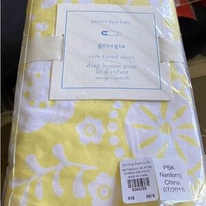 Pottery Barn “Georgia” yellow floral crib sheets.